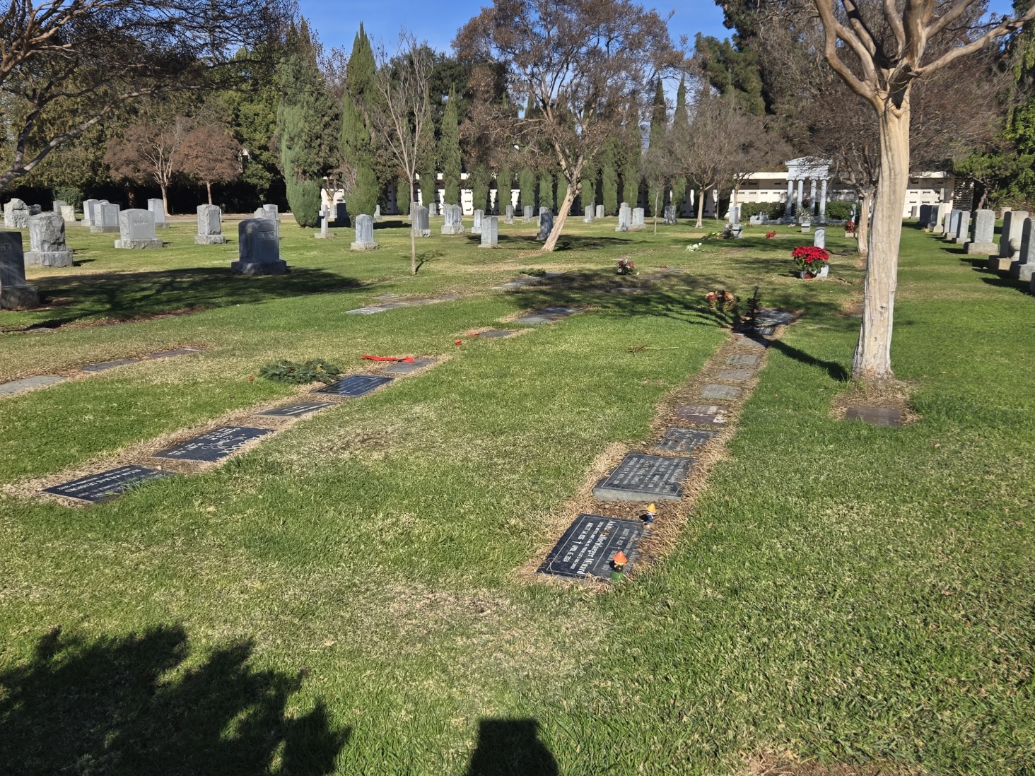 Block N - Companion Lawn Crypt with gravestones and trees.